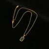Sleek Gold Plated Black Pedant Clavicle Chain Sleek Gold Plated Black Pedant Clavicle Chain.