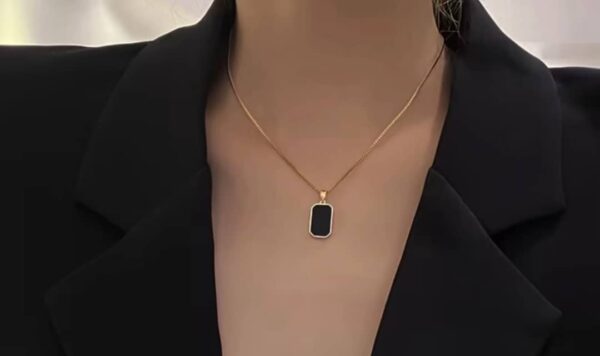 Sleek Gold Plated Black Pedant Clavicle Chain2 Sleek Gold Plated Black Pedant Clavicle Chain.